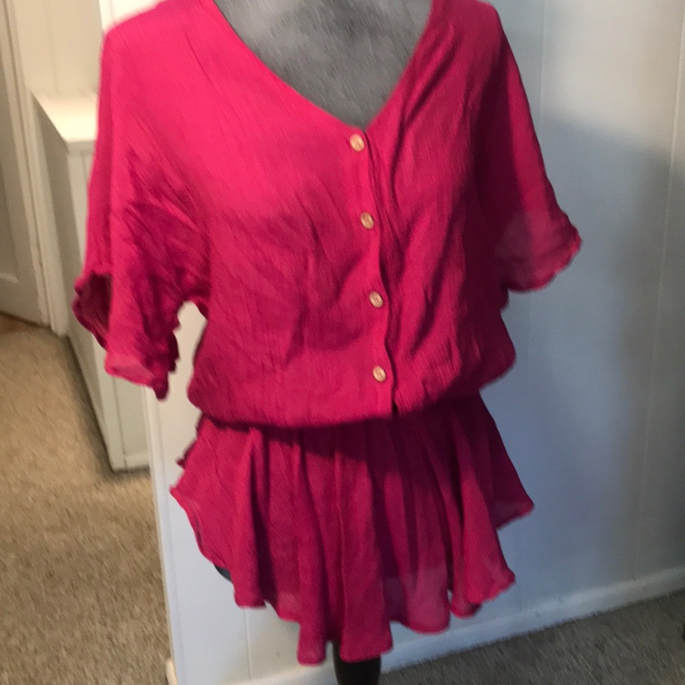 En femme pink medium short sleeve elastic waist rayon top that buttons in front